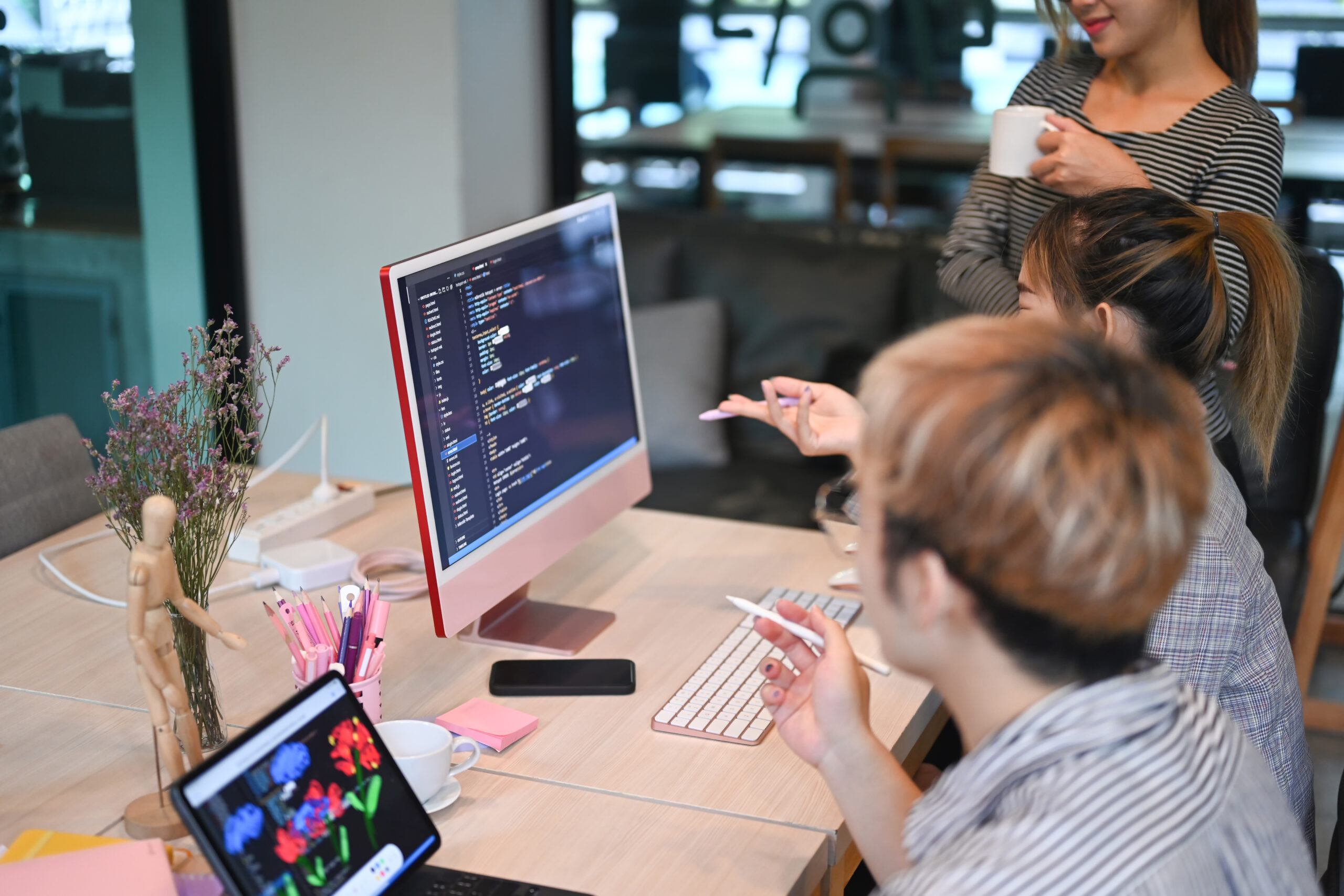 Young software developers team working together for developing w